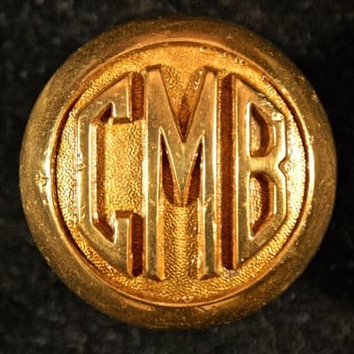 C M B